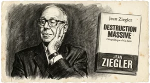 Jean Ziegler tenant son livre « Destruction massive : géopolitique de la faim »